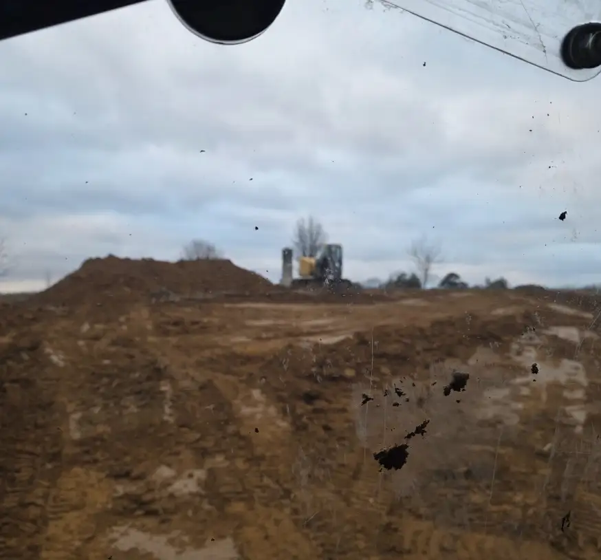 Wide cut of bare dirt on a building site