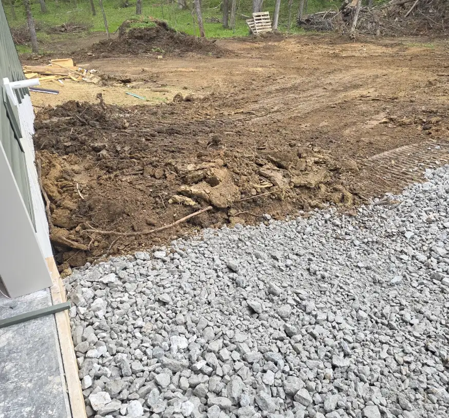 Stone and fill placed along the side of a new house